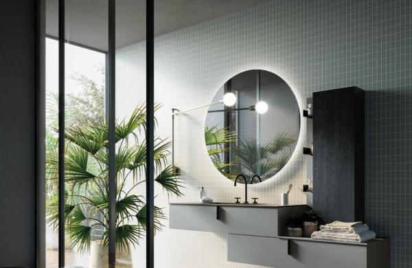 Meuble de salle de bains tendance bleu posé avec un décalage 